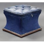 A Victorian square box ottoman with concave sides & buttoned seat, upholstered blue velour, & on bun