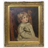 ENGLISH SCHOOL, late 19th century. A half-length portrait of a young child seated in a carved oak