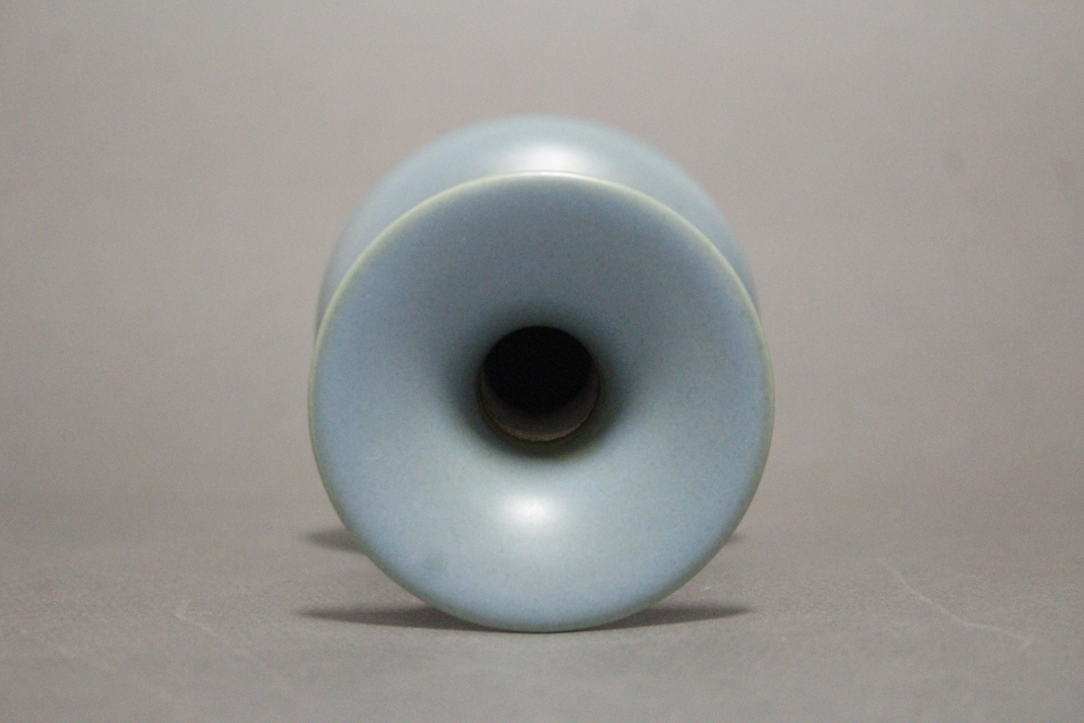 A Chinese pale blue glazed porcelain squat round vase with wide flat rim to the narrow neck, bears - Image 5 of 5