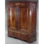 A 19th century CONTINENTAL FIGURED MAHOGANY WARDROBE, the upper part with cavetto cornice & enclosed