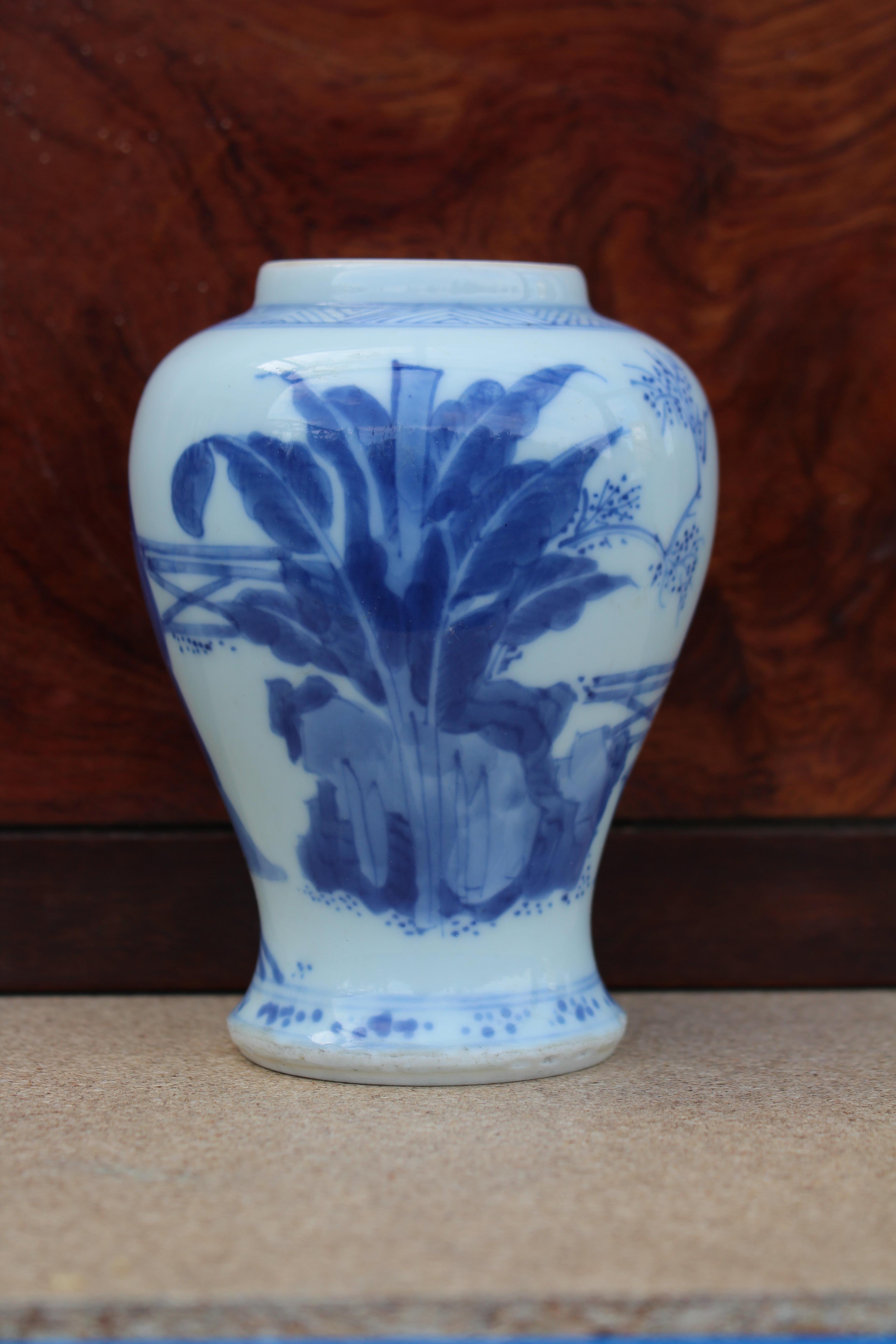 A Chinese Kangxi period blue & white porcelain small baluster vase painted with ladies in a formal - Image 2 of 11