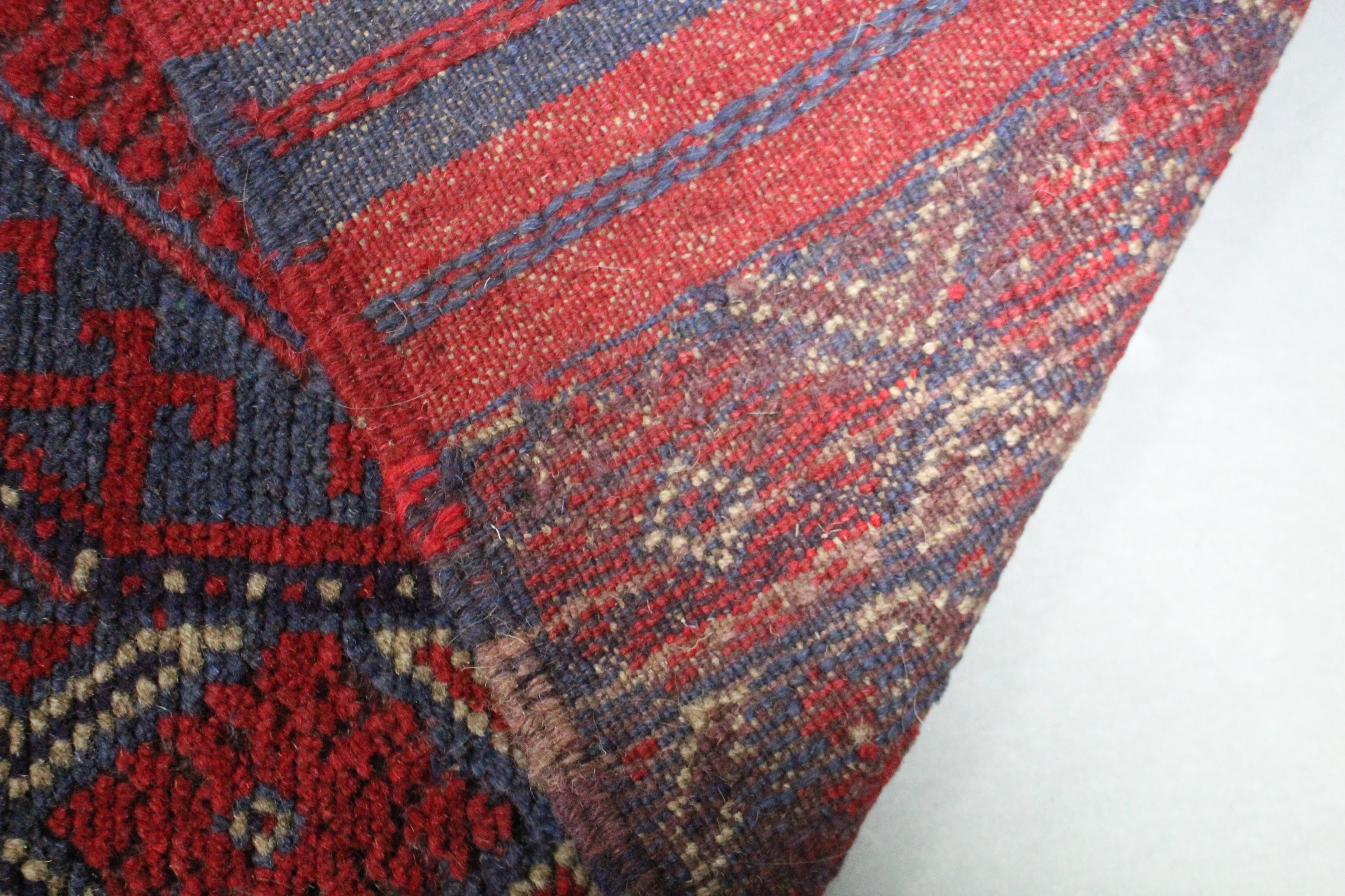 A Meshwari runner of deep blue, crimson, & ivory ground, with row of five lozenges in multiple - Image 2 of 2