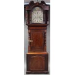 A mid-19th century longcase clock, the 14” painted arch dial inscribed: “Elias E. Jones,