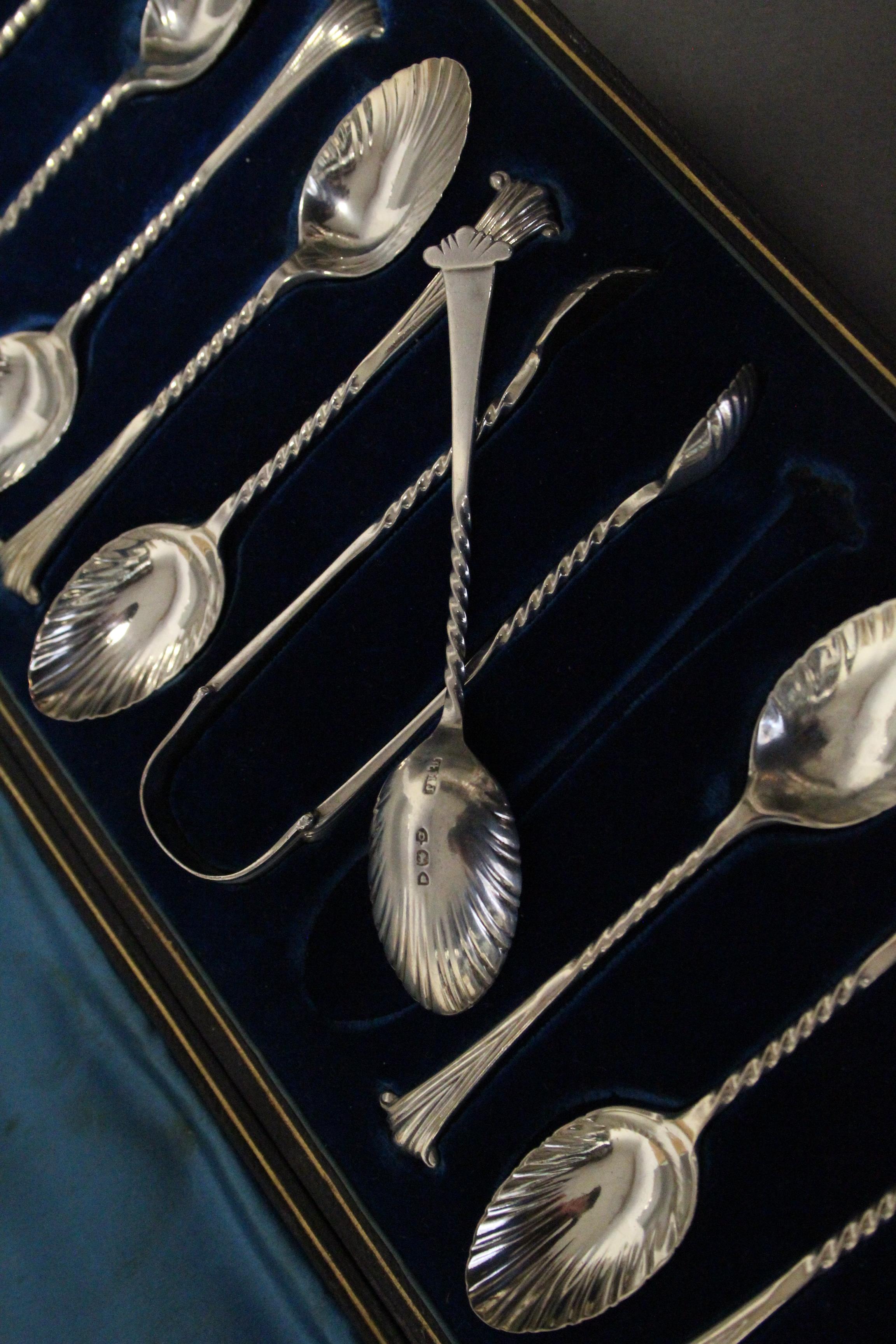 A set of twelve Victorian silver Onslow pattern teaspoons & matching sugar tongs with writhen - Image 2 of 2