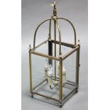 A brass framed hall lantern (converted to electricity), fitted a four-branch light fixture to the