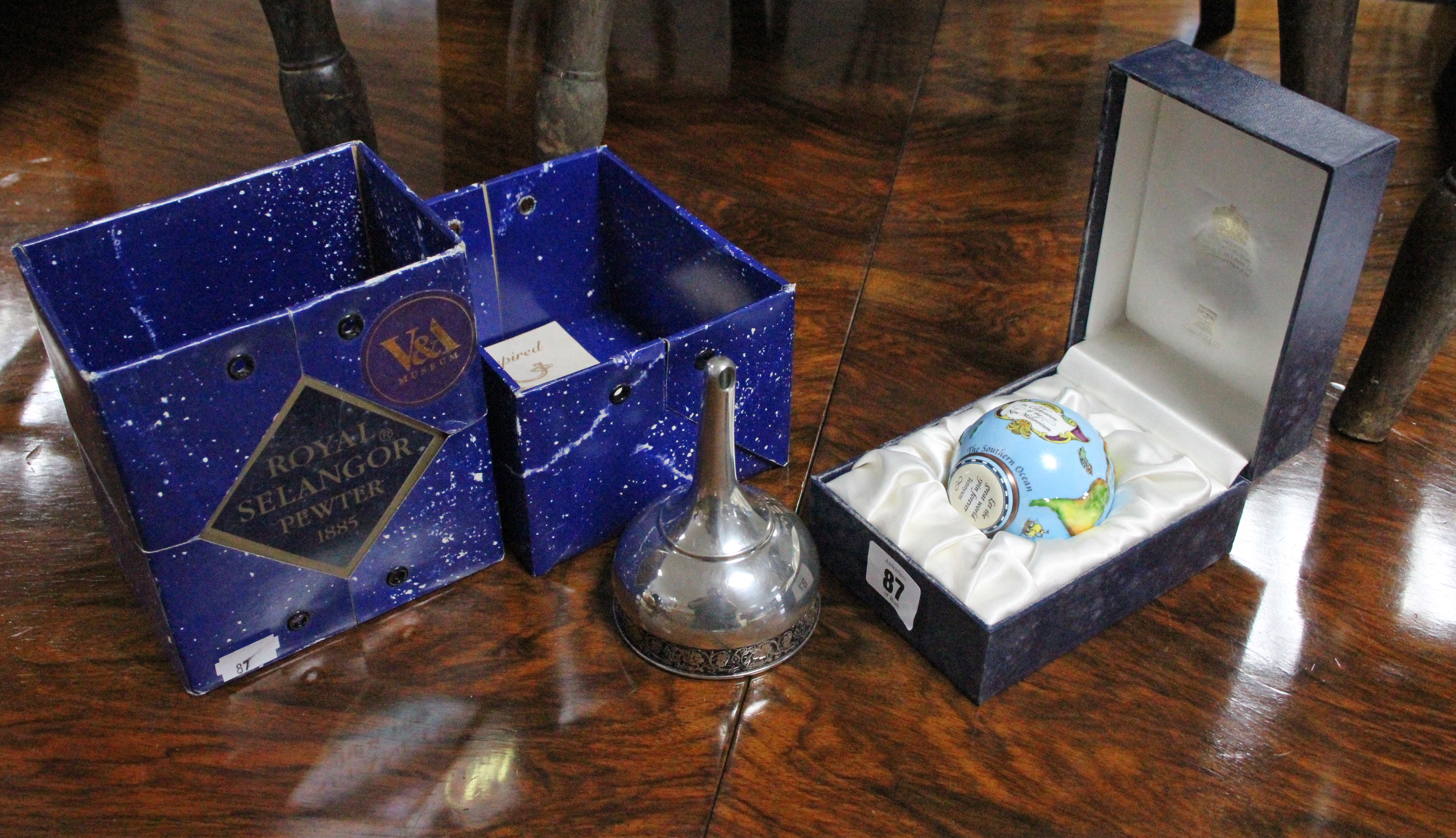 A Halcion Days “Bonbonnieres” ornament; a Royal Selangor pewter wine funnel, both boxed; various