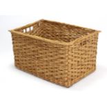 A large wicker rectangular basket, 36½” long x 20” high.