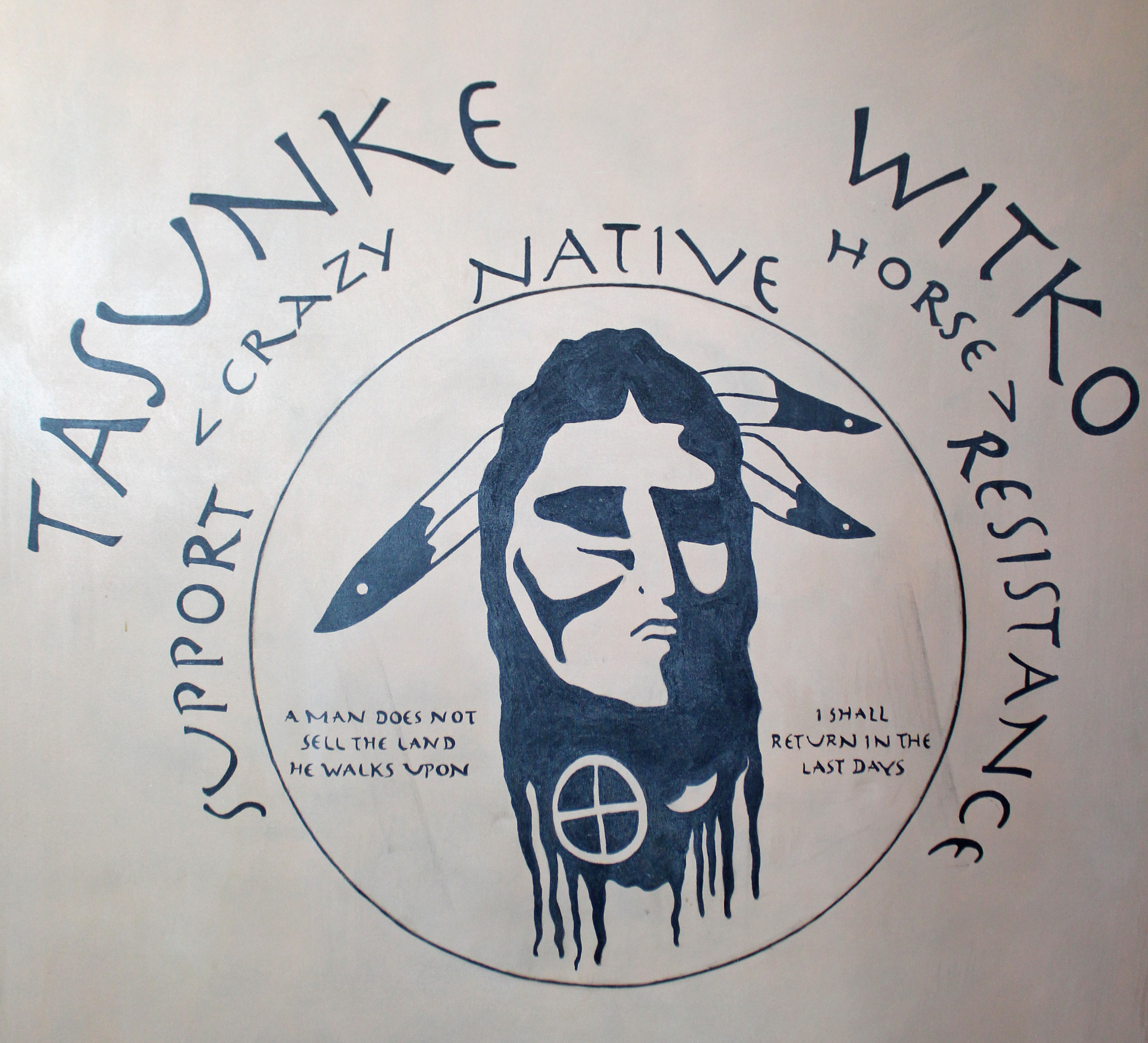 A large oil painting on canvas depicting a native American titled “Support Native Resistance”,