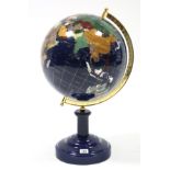 A modern semi-precious coloured hardstone terrestrial globe on blue-finish stepped circular plinth