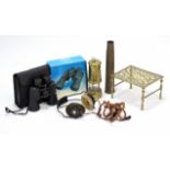 A Welsh brass miner’s lamp; a brass trivet; a brass shell-case vase; a pair of A.M. headphones; &