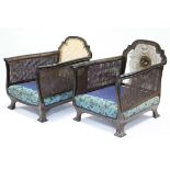 A late 19th/early 20th century Bergére three-piece suite comprising a three-seater sofa & pair of