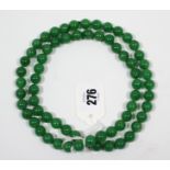 A modern jade necklace, 31” long.