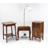 An Edwardian mahogany square two-tier occasional table on square tapered legs, 18½” wide; together