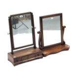 A mahogany rectangular swing toilet mirror, fitted three small drawers to the box base, 23½” high; &