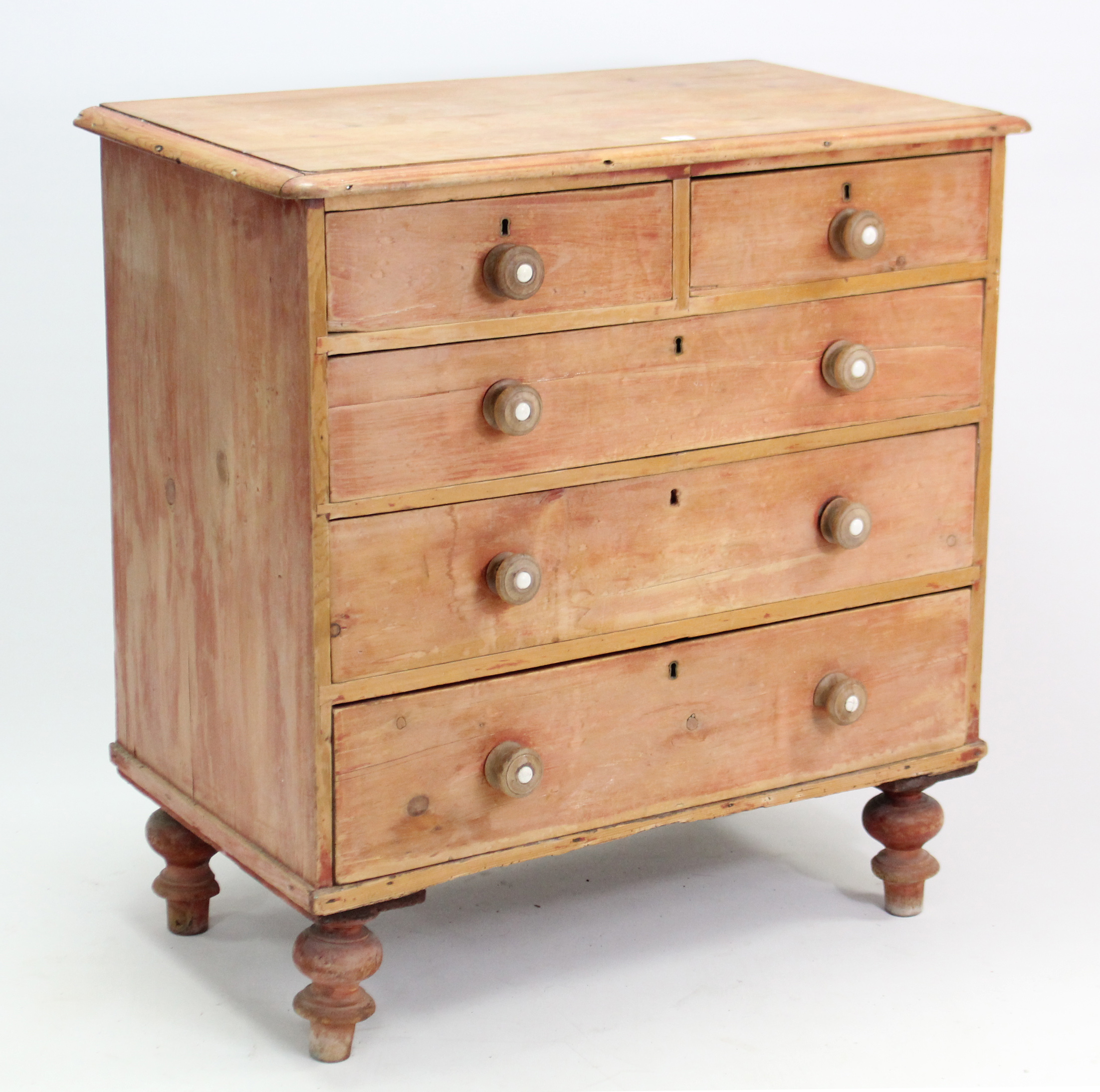 A late Victorian pine chest fitted two short & three long graduated drawers with turned knob