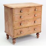 A late Victorian pine chest fitted two short & three long graduated drawers with turned knob