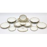 A Bishop china thirty-four piece part dinner service of white ground & with gold rims, part w.a.f.
