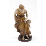 An Austrian composition figure group of a young lady with girl by her side, (No. 637), 19” high.