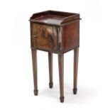 A 19th century mahogany tray-top bedside cupboard enclosed by panel door, & on short square