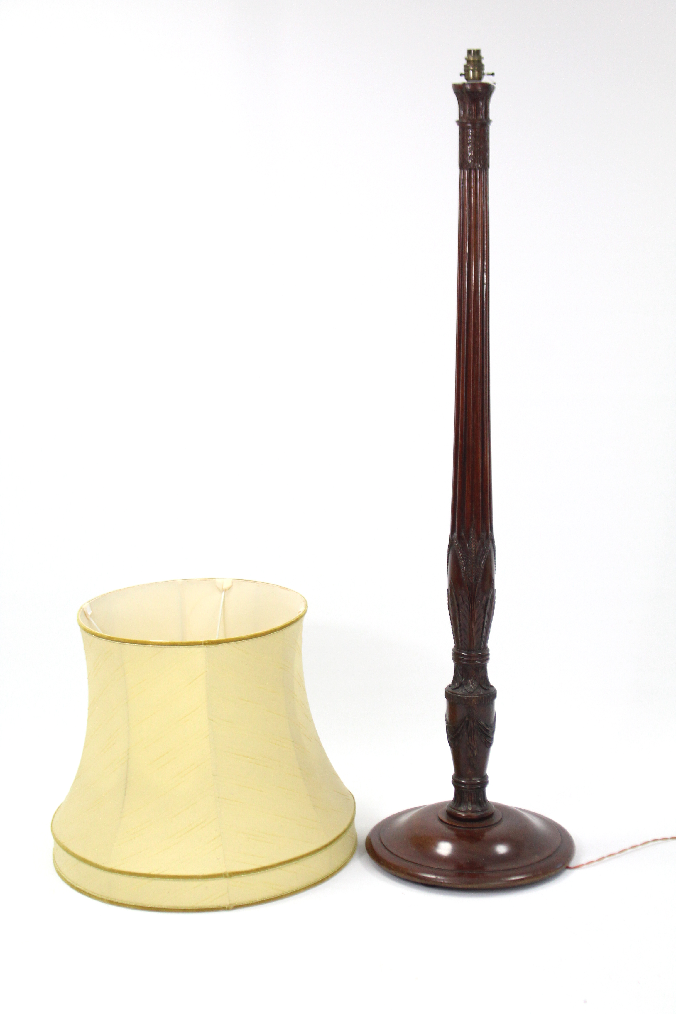 A carved mahogany standard lamp on circular base, complete with shade. - Image 2 of 2