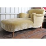 A Victorian-style chaise longue upholstered fawn velour, & on short square legs with brass