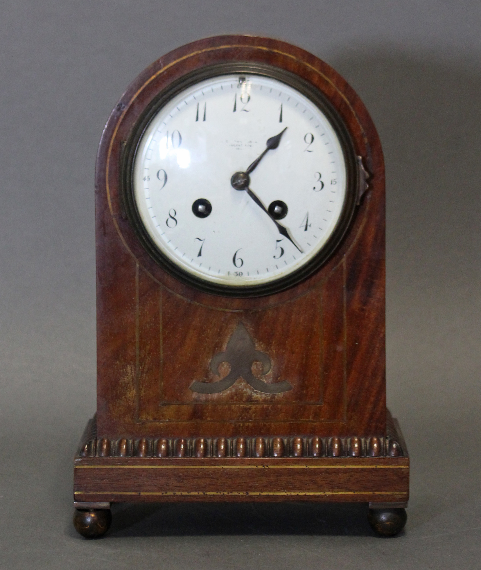 A 19th century mantel clock, the 4¼” white enamel dial with Arabic numerals, eight-day striking