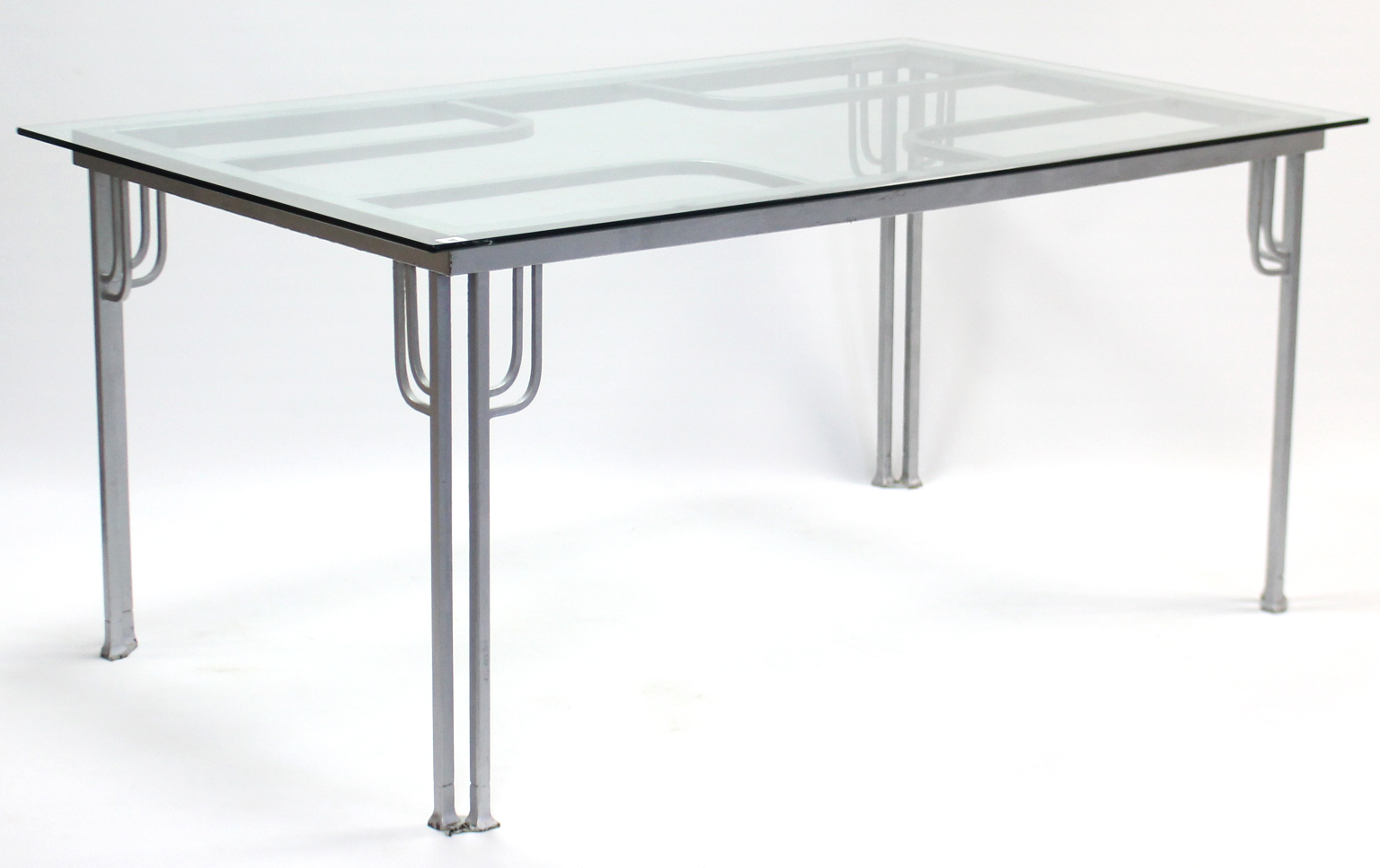 A silvered-metal conservatory table on stylised square legs & with tempered-glass rectangular top,