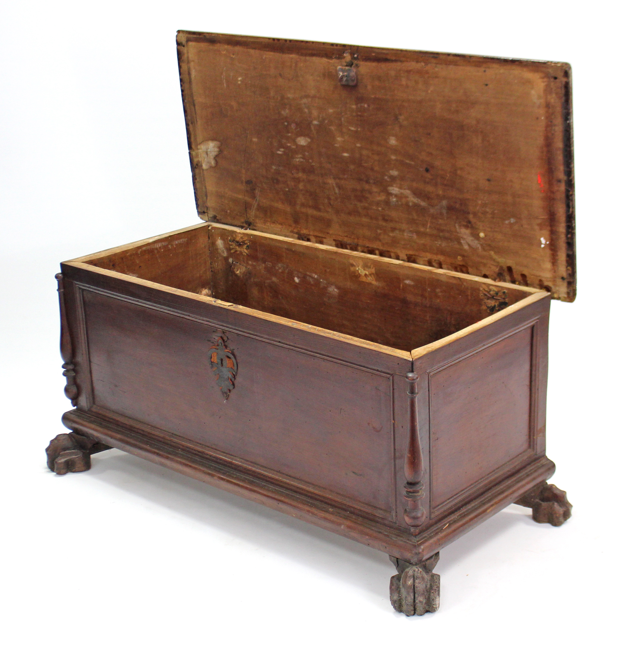 A 19th century continental hardwood coffer with hinged lift-lid, panelled front & sides, & on carved - Image 2 of 2