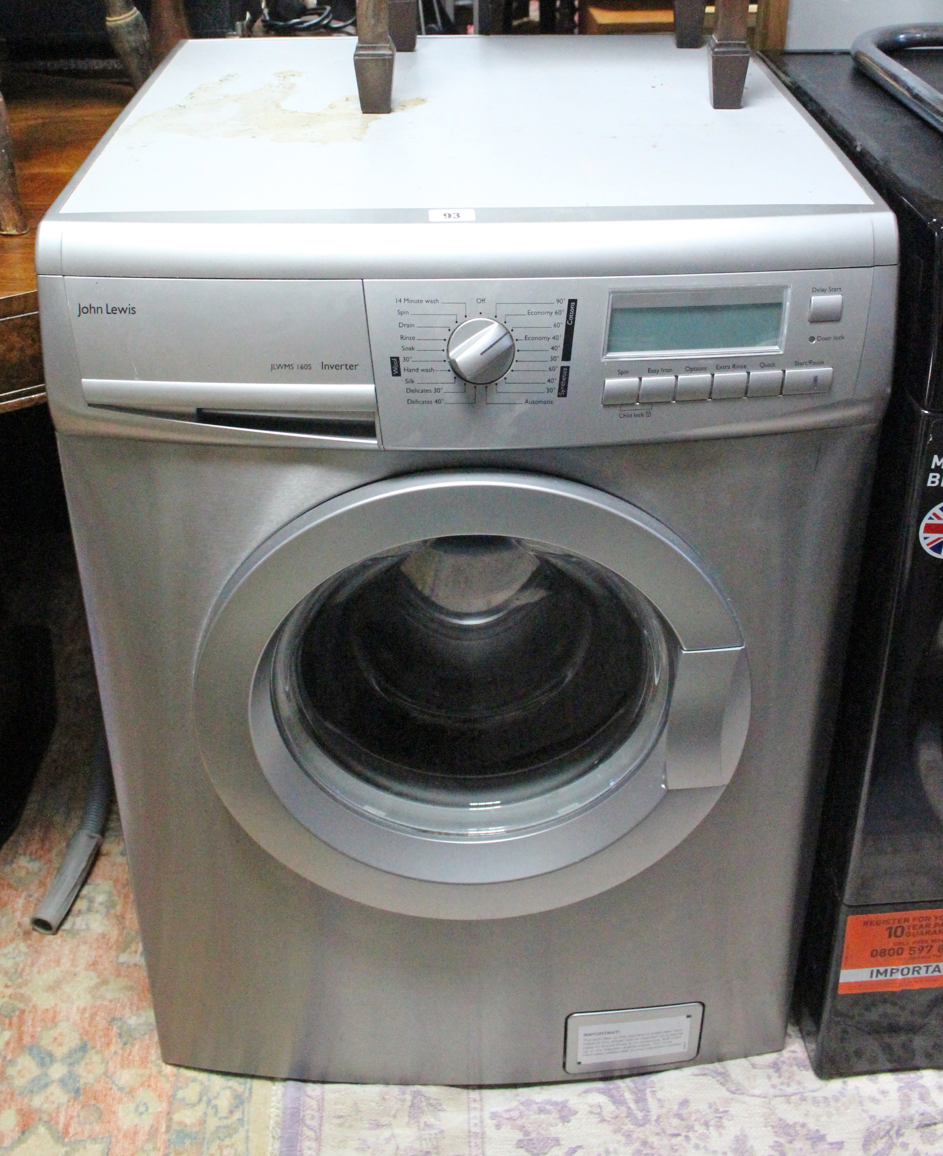 A John Lewis washing machine, in silvered-finish case.