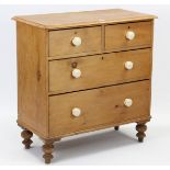 A Victorian pine small chest, fitted two short & two long graduated drawers with ceramic knob