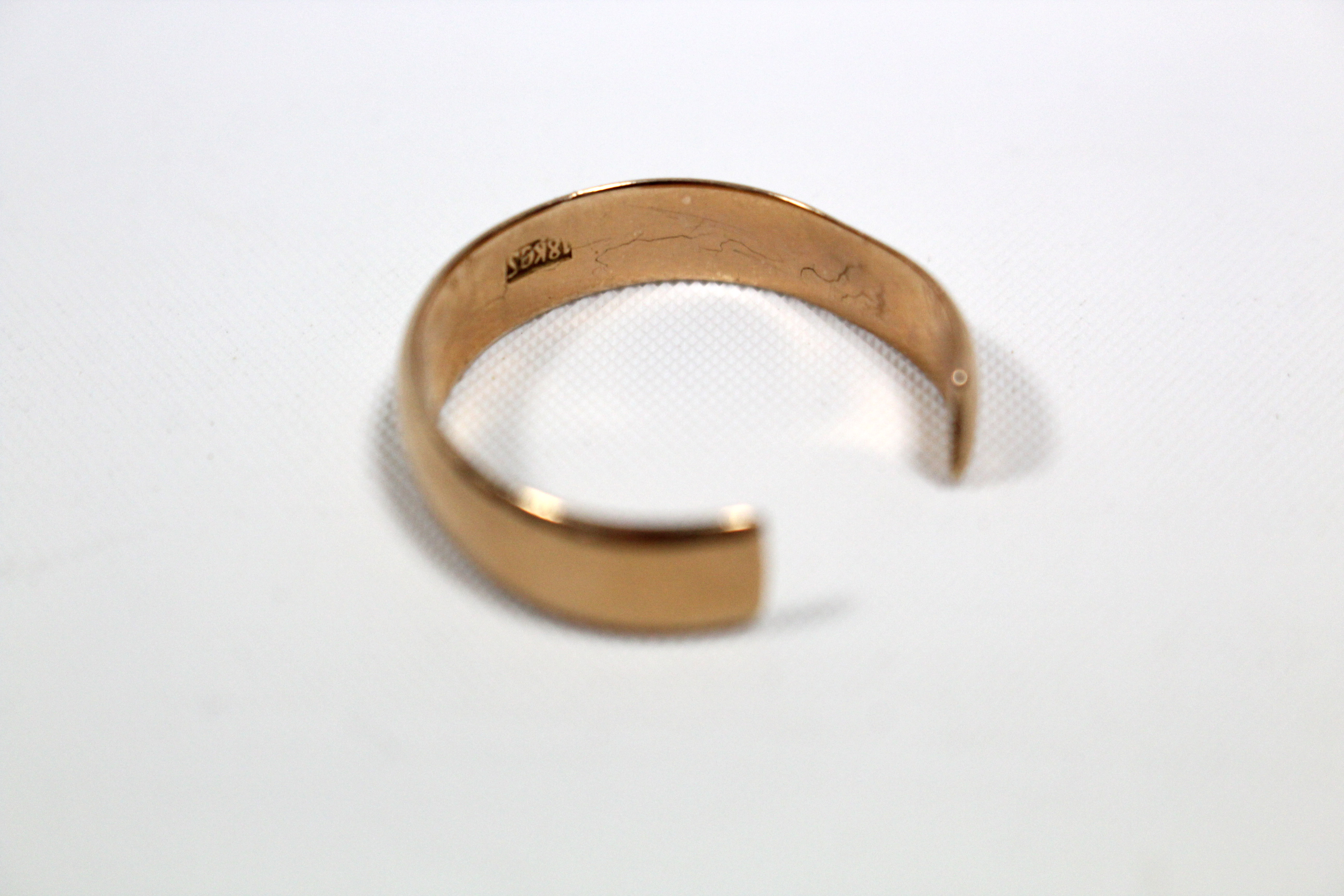 A yellow-metal wedding band stamped “18k”; & an 18ct. gold-cased ladies’ wristwatch, lacking strap. - Image 2 of 2