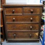 A late Victorian mahogany chest fitted two short & three long graduated drawers with turned knob