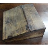 A late 17th century elm Bible box with sloping hinged lid; 18½” wide x 17½” deep.