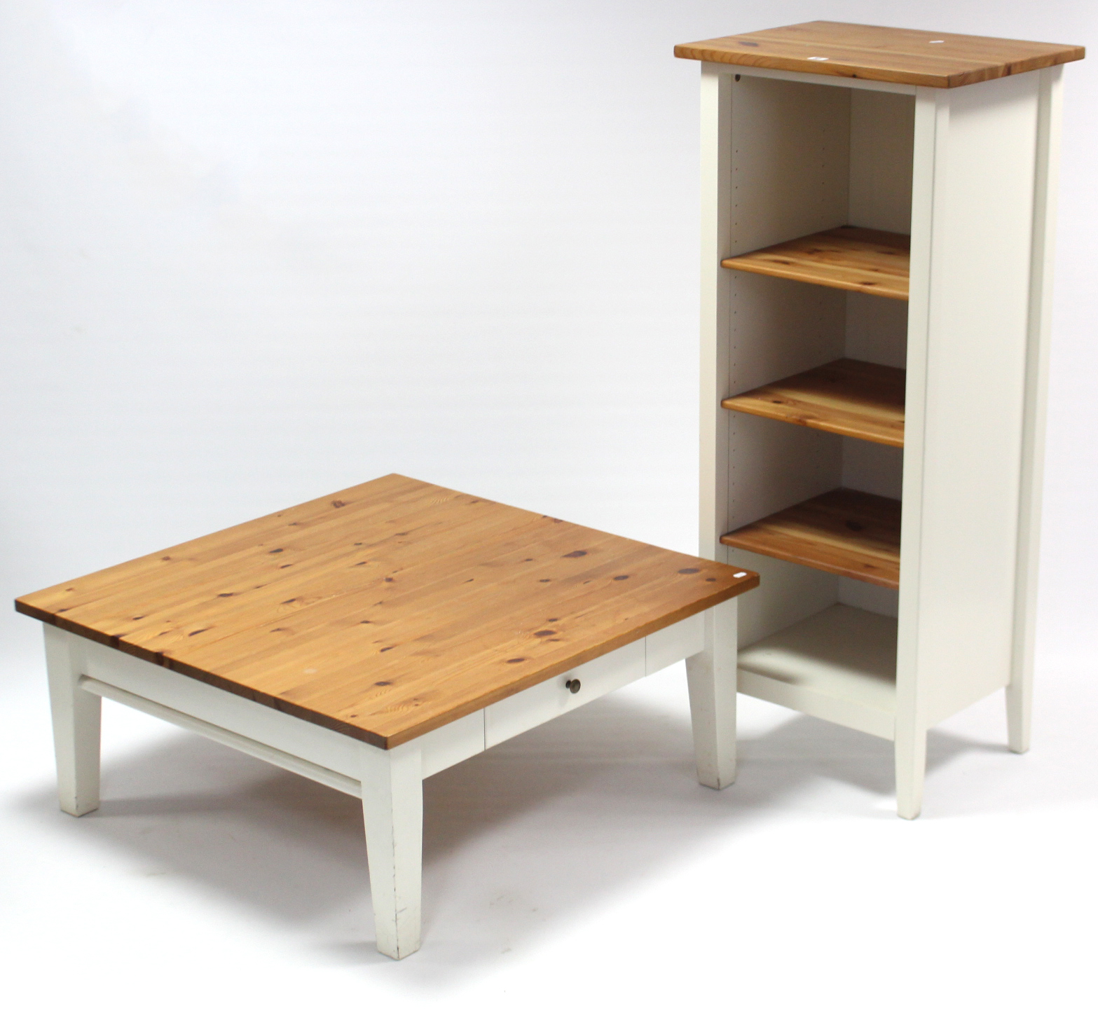 An Ikea pine & white finish four-tier standing open bookcase, 22¼” wide x 51¾” high; & a matching