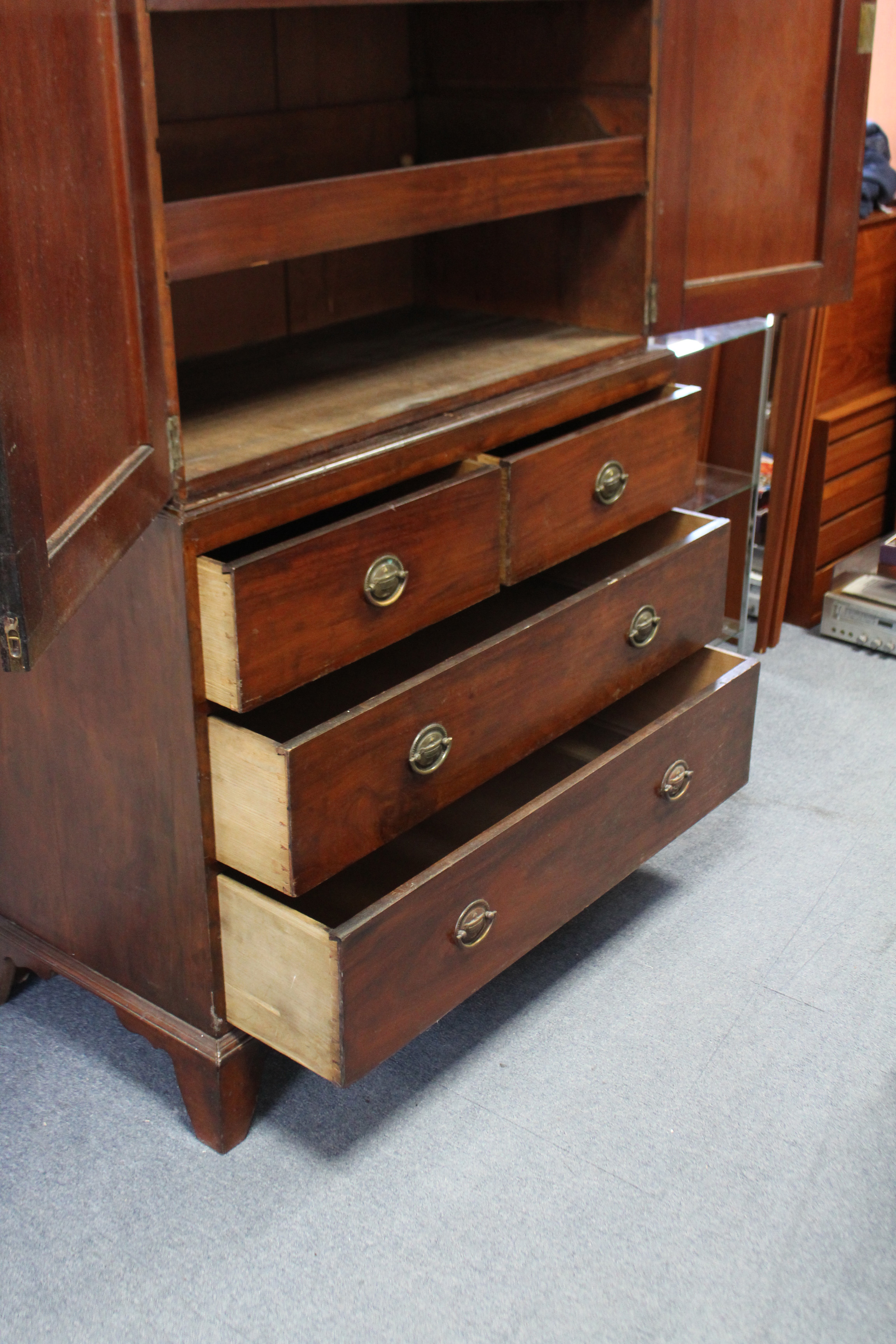 A 19TH CENTURY MAHOGANY LINEN PRESS the upper part fitted two sliding trays enclosed by pair of - Image 2 of 3