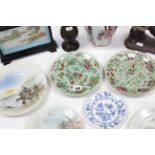Three Chinese porcelain dishes each of celadon ground & with bright-coloured floral, butterfly &