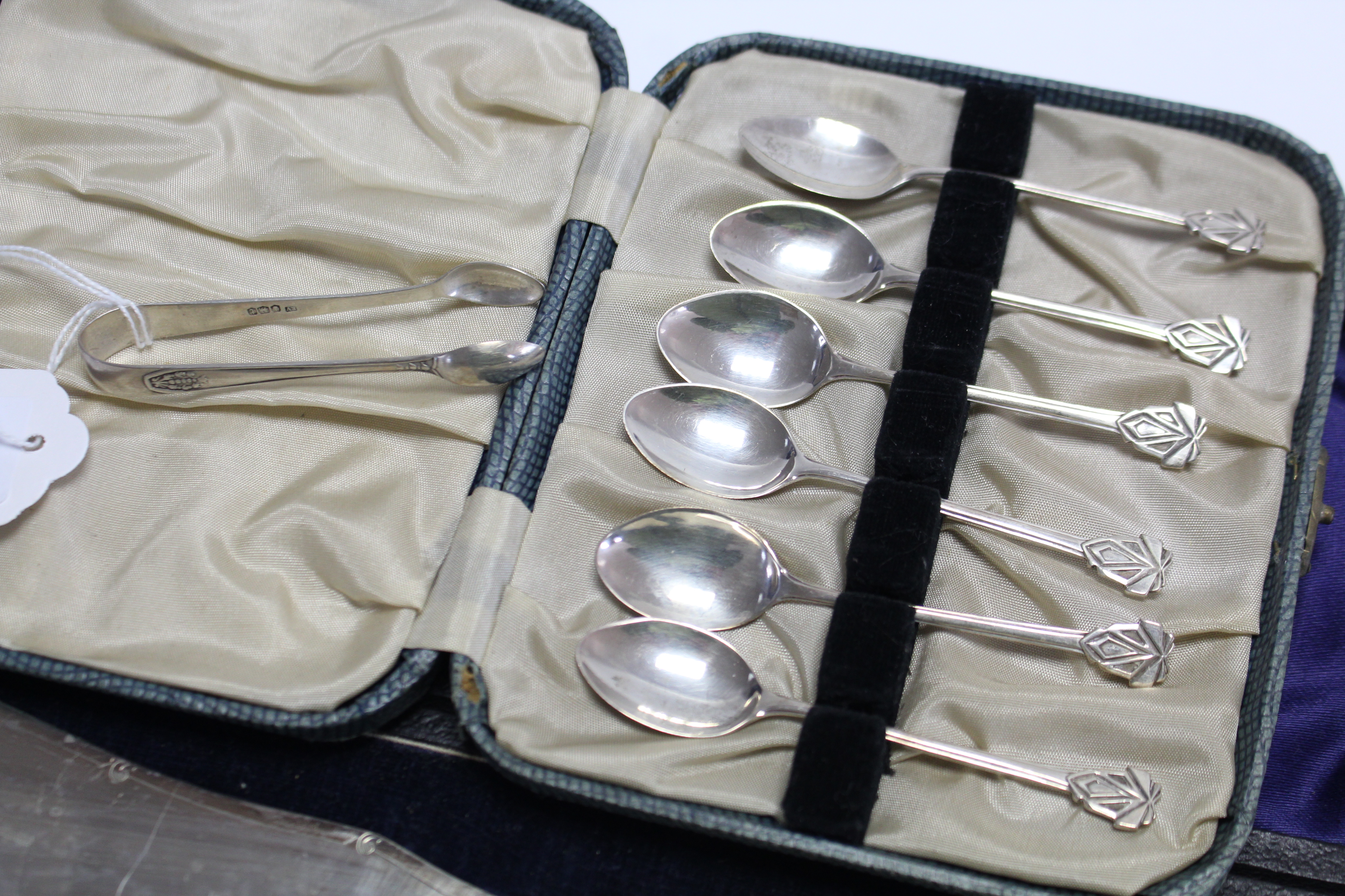 A Set of six George VI silver teaspoons with fancy terminals, Birmingham 1947, cased; a similar pair - Image 2 of 3