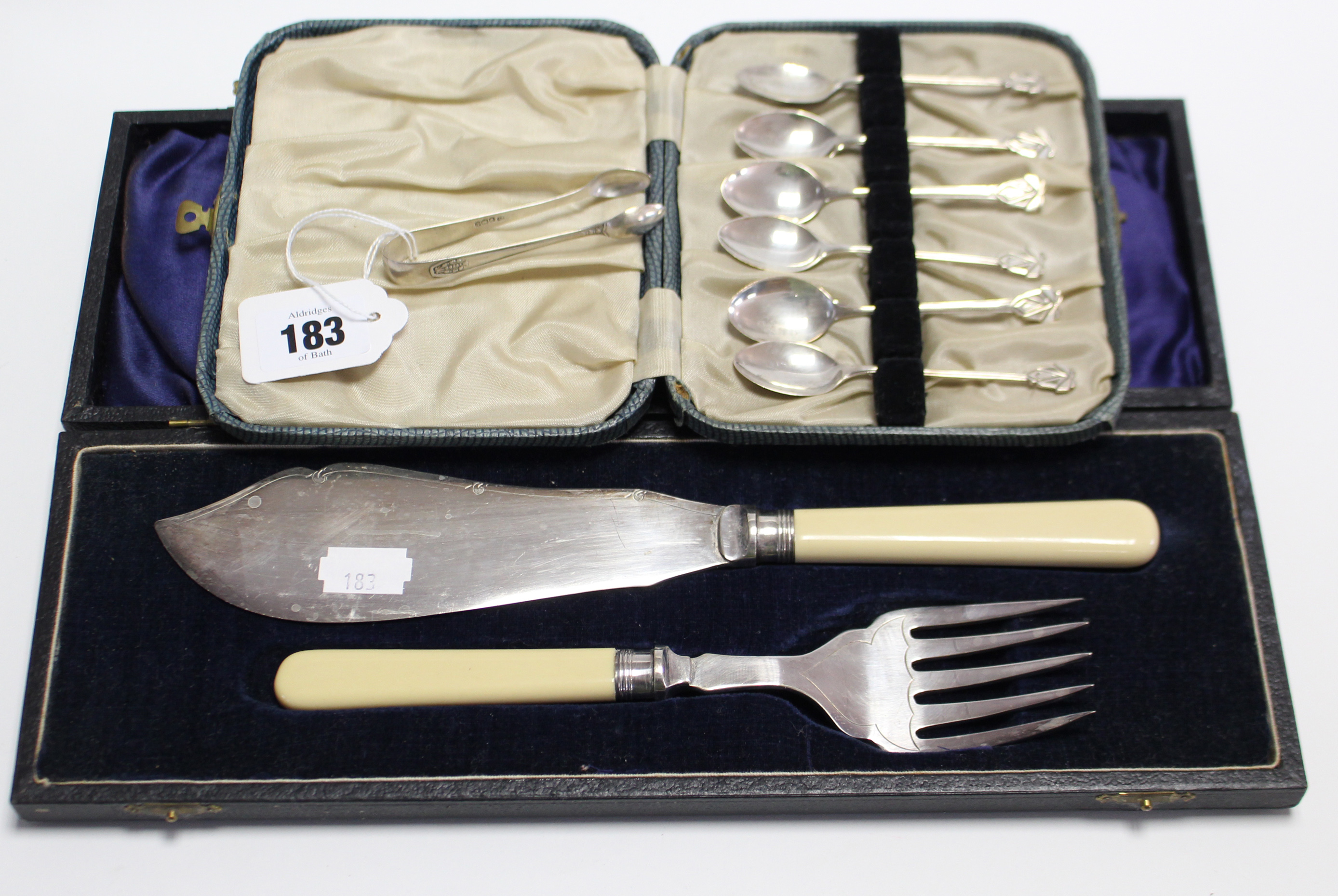 A Set of six George VI silver teaspoons with fancy terminals, Birmingham 1947, cased; a similar pair