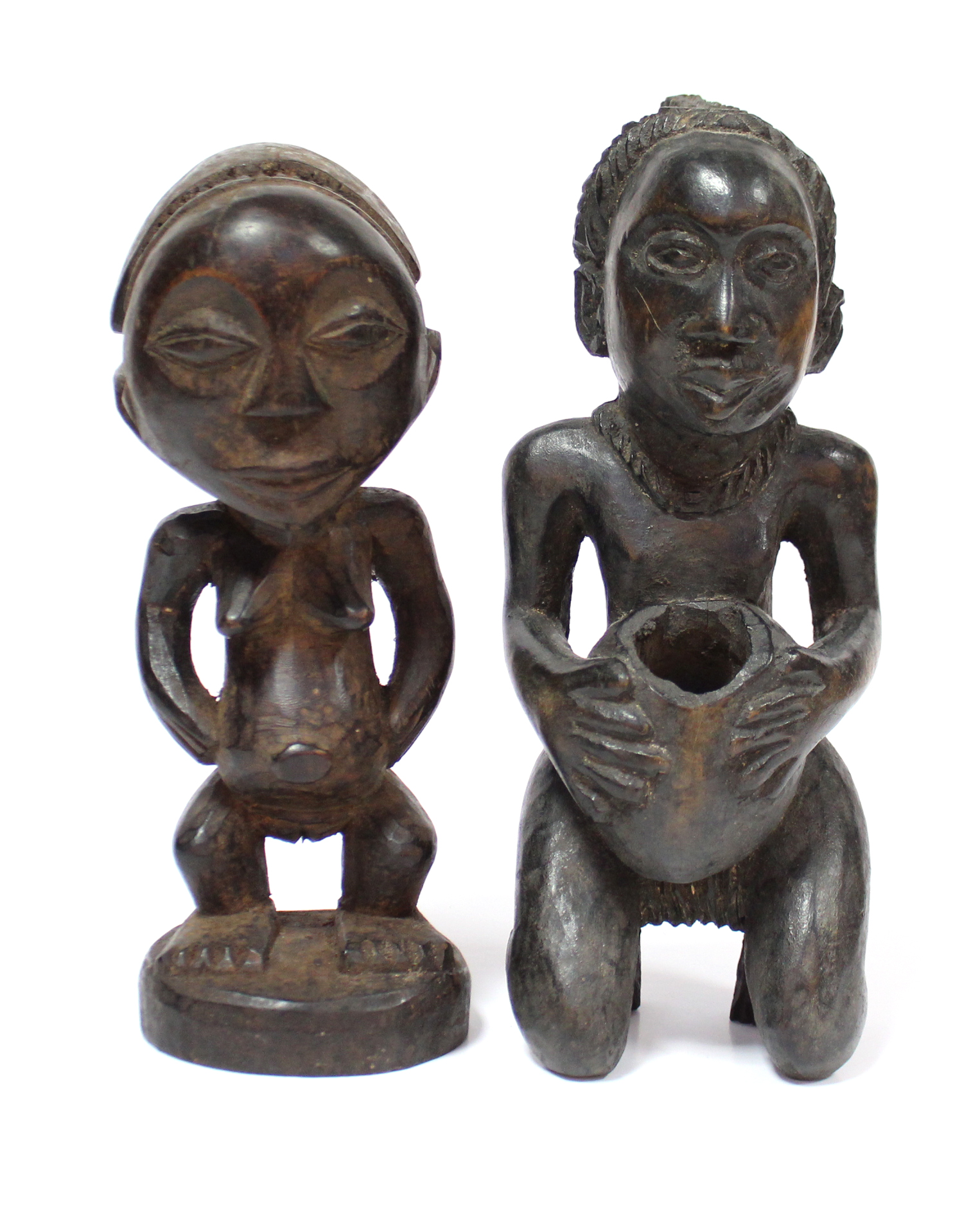 A Luba carved wood standing female figure, 9”; & a similar kneeling figure holding a bowl, 9¾”.