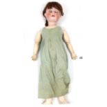 An antique German bisque head girl doll (C W 120 9) with brown sleeping eyes, open mouth, & with