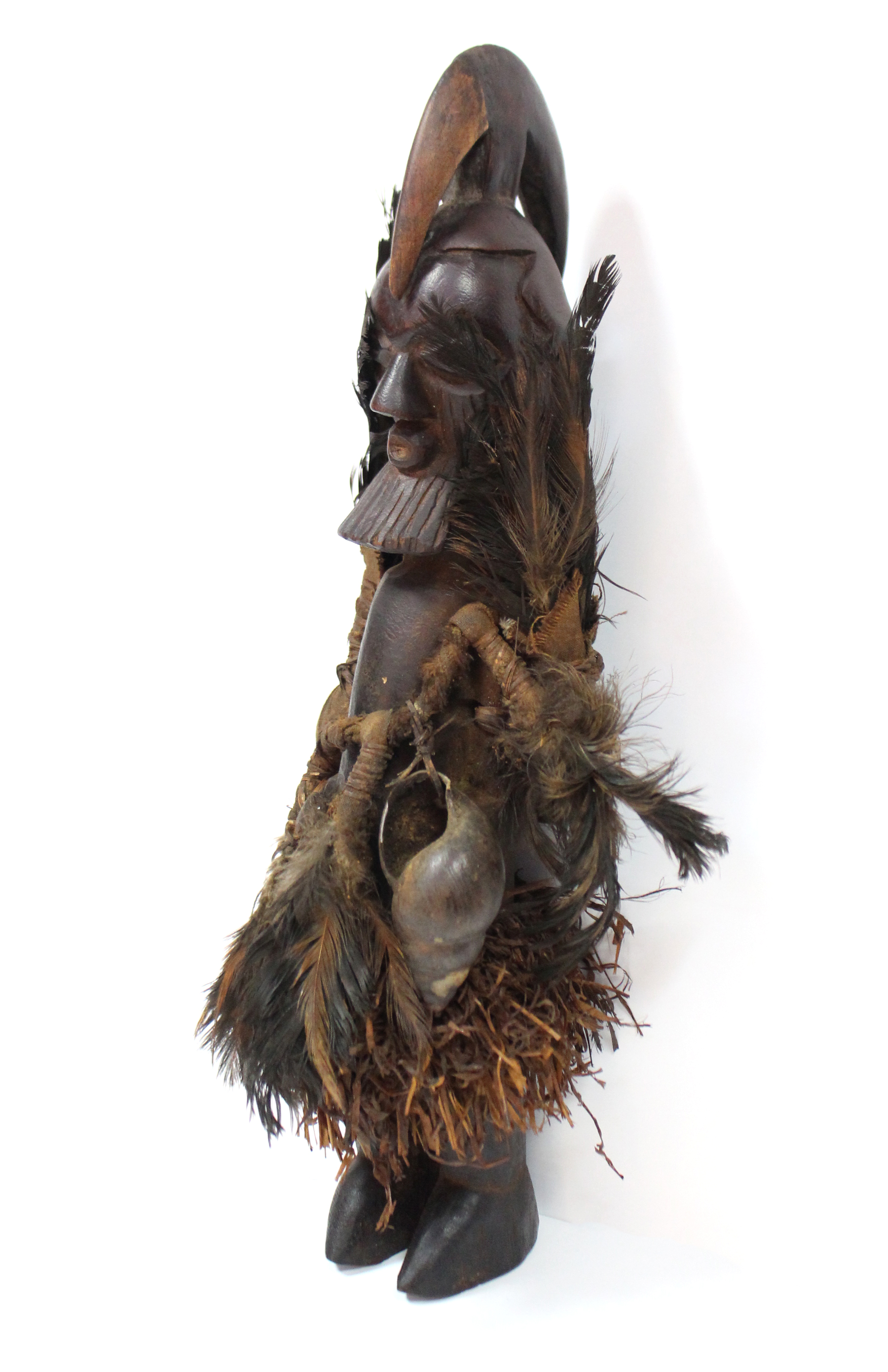 A Teke fetish figure with speer-shaped head-piece & scarified face, pouches of feathers either side, - Image 3 of 4