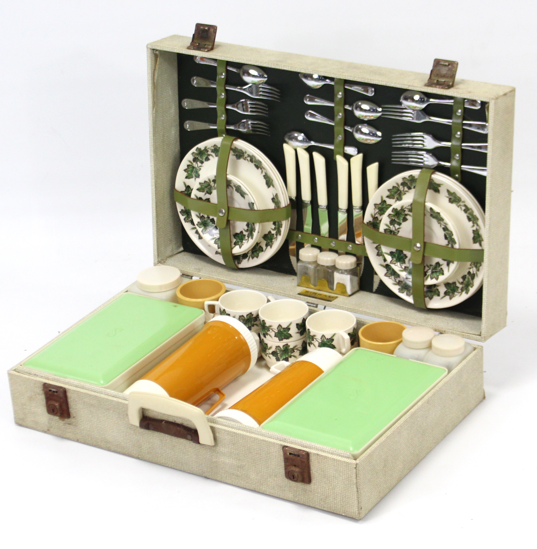 A Sirram fibre-covered picnic case with contents.