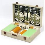 A Sirram fibre-covered picnic case with contents.