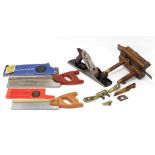 A Stanley Bailey “No. 5” smoothing plane; a treen moulding plane; two hand saws; & a spokeshave.