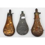 Two 19th century copper shot flasks, each with embossed hunting scene decoration; & a similar pewter