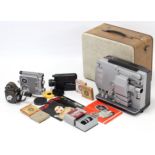 A collection of vintage cine equipment including cameras, 9.5mm films, an 8mm sound projector, etc.