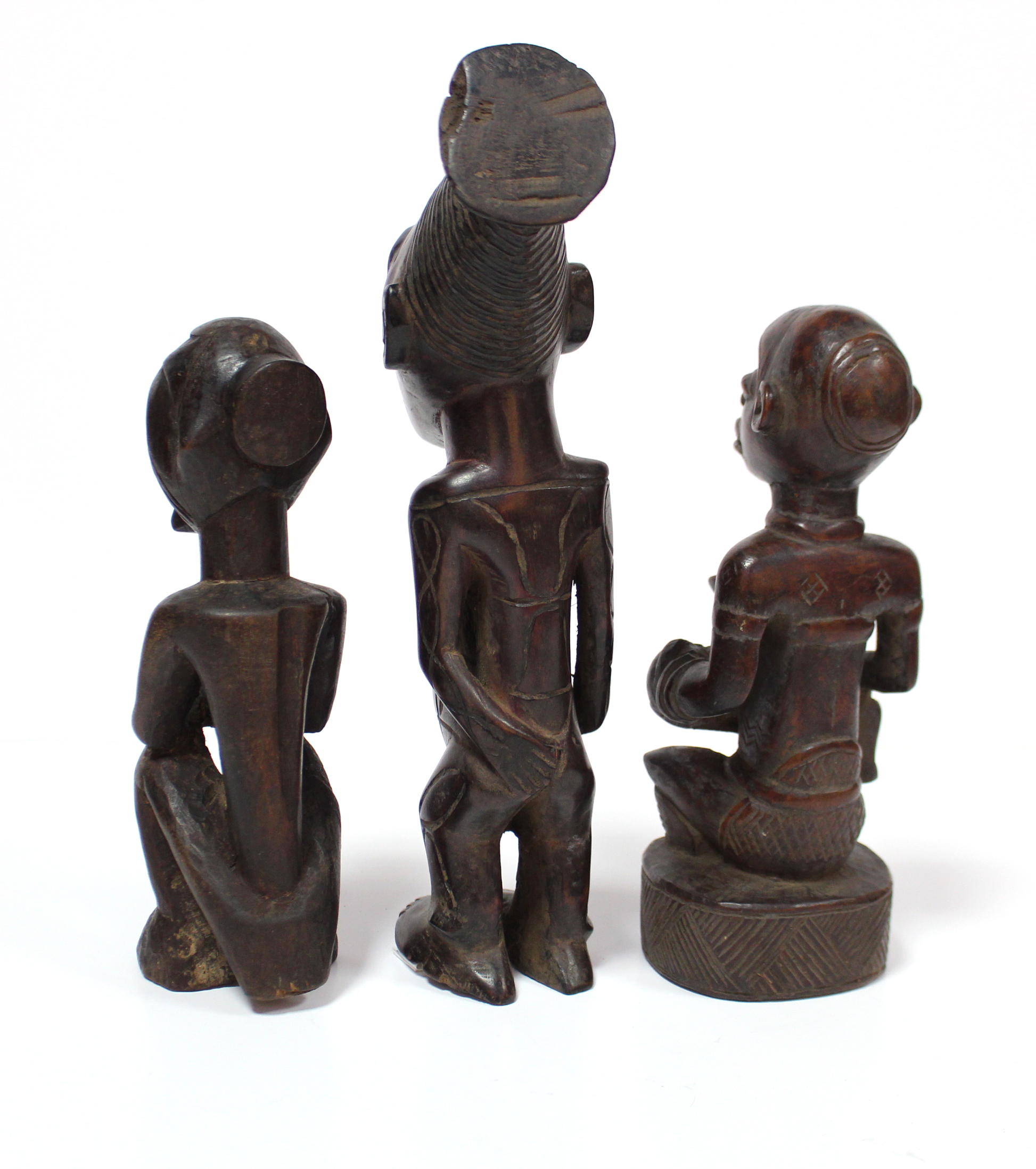 A Kongo carved wood maternity figure seated cross-legged, an infant on her lap, 8¼”; a similar - Image 4 of 4