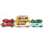 Two Corgi scale model racing cars; two Dinky scale model racing cars; a Corgi scale model “