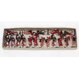 Seventeen Britains painted lead Scots Guards soldier figures.