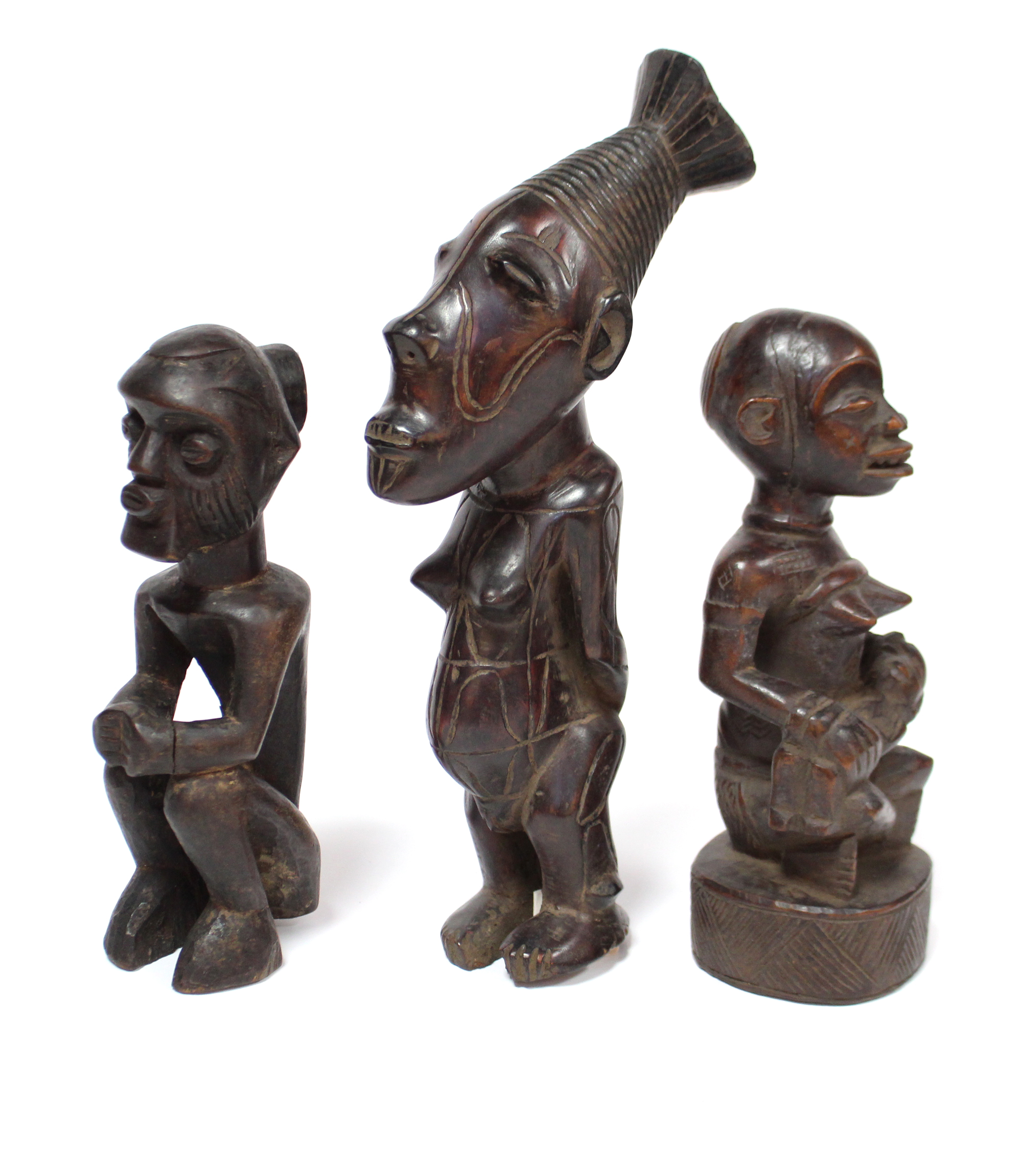 A Kongo carved wood maternity figure seated cross-legged, an infant on her lap, 8¼”; a similar - Image 3 of 4